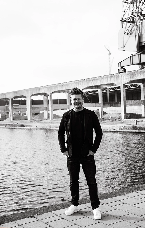 Laslo van den Broek standing in harbour